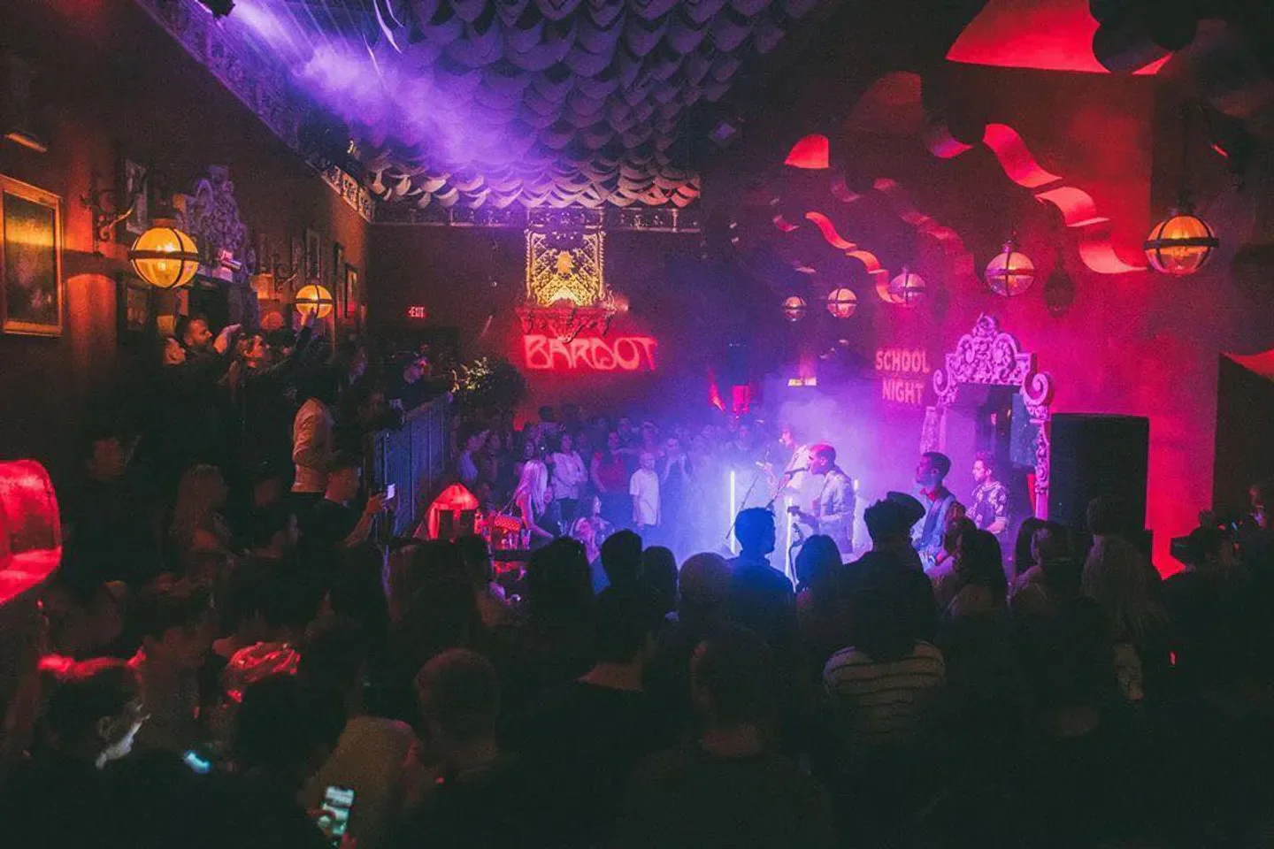 Inside Bardot Hollywood nightclub in Los Angeles, a live music performance with a crowd.