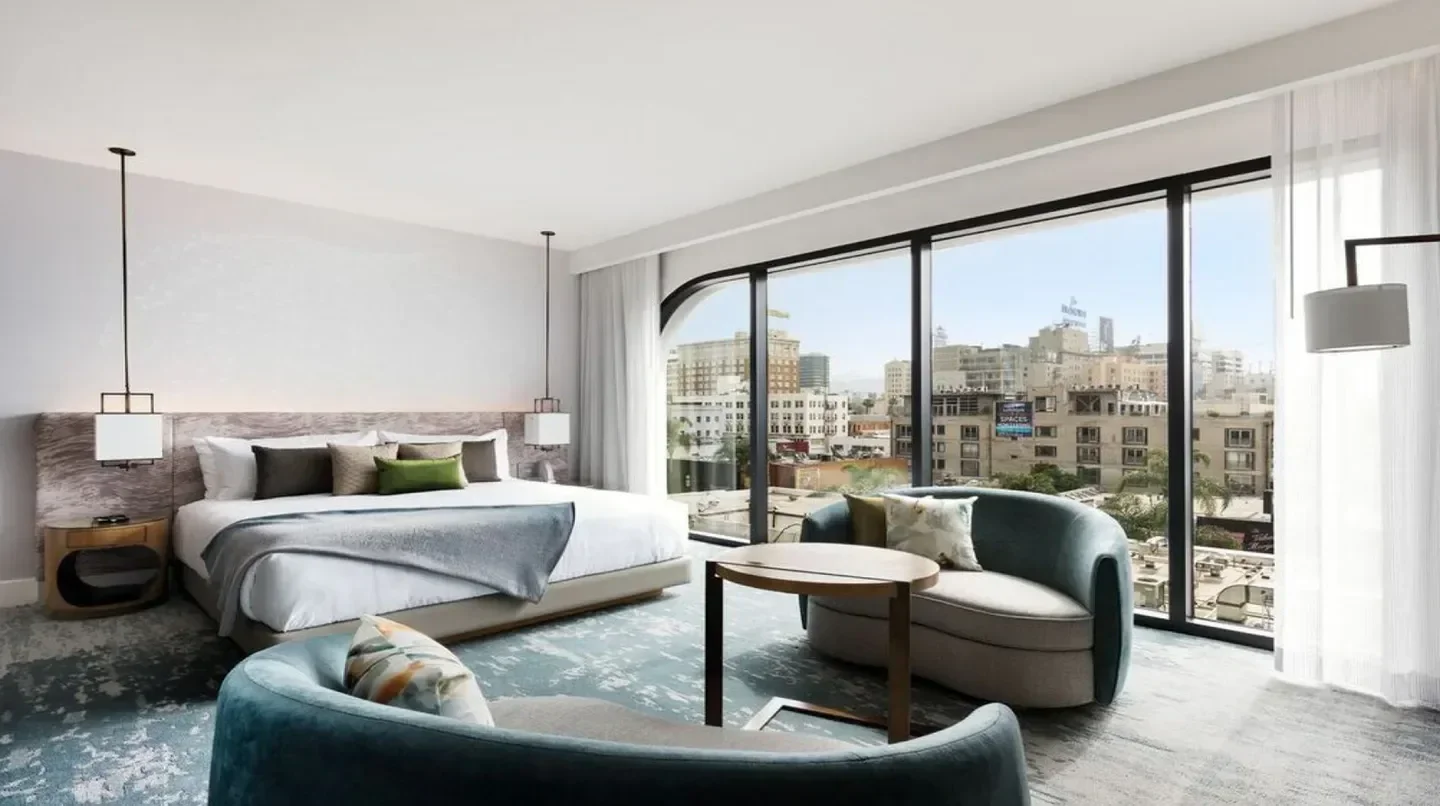 Spacious hotel room with city views at Dream Hollywood in Los Angeles