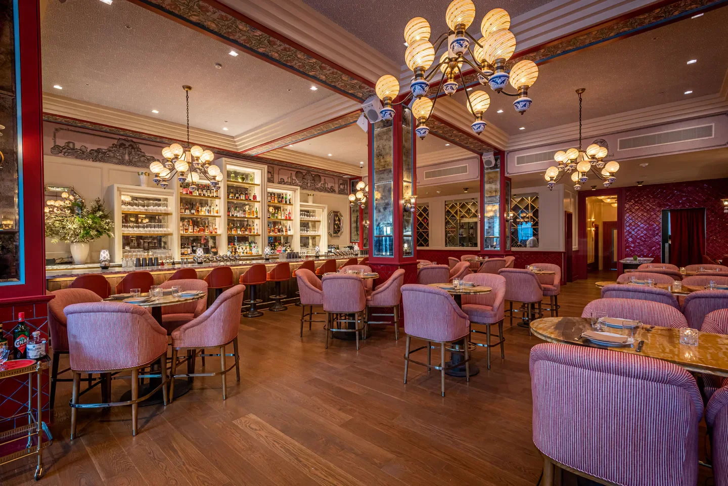 Interior dining at Giorgio Baldi in Los Angeles, featuring stylish decor and bar.