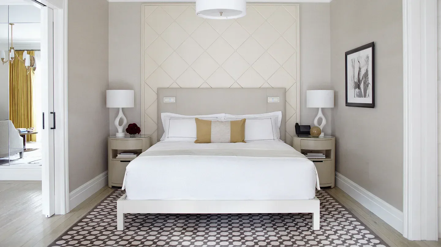 Elegant bedroom at Hotel Bel-Air in Los Angeles with stylish decor and cozy atmosphere.