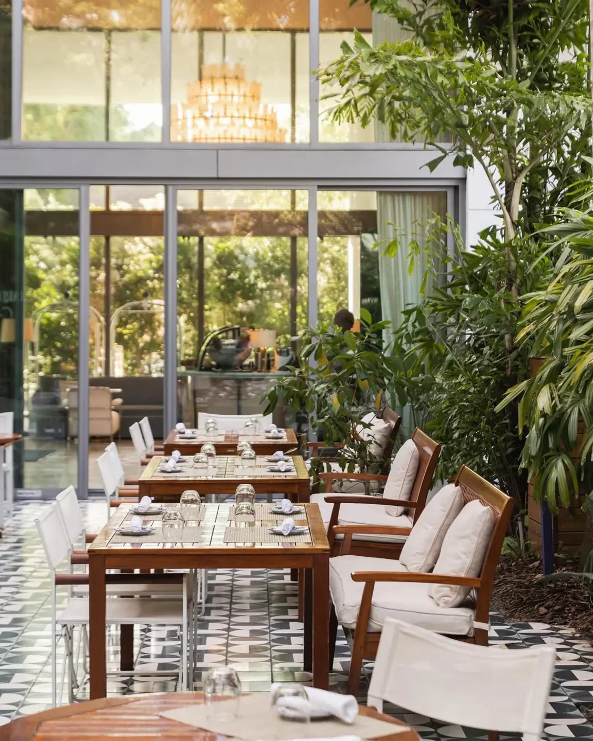 Elegant dining space at Il Gardino restaurant in Los Angeles with outdoor seating.