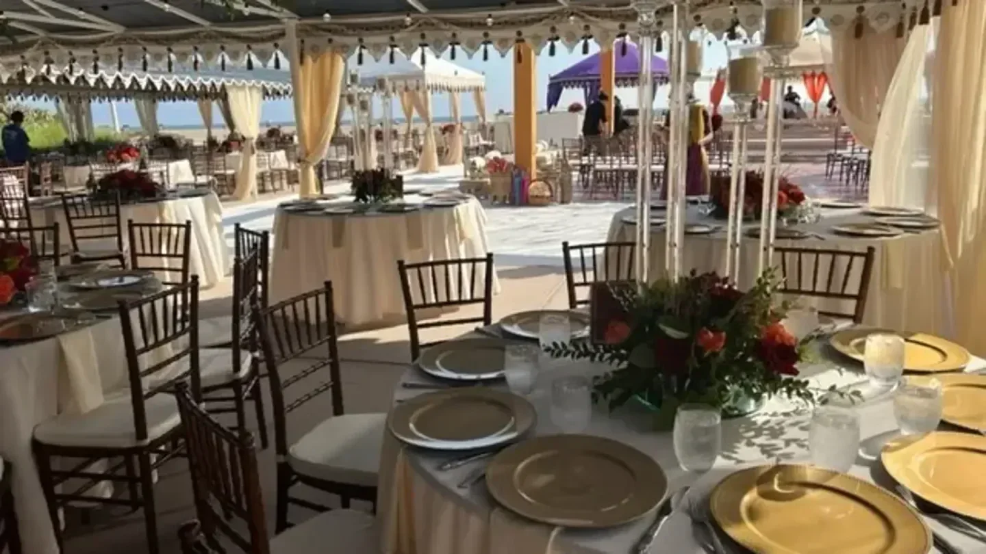 Elegant event setup at Jonathan Beach Club in Los Angeles, featuring ocean views.