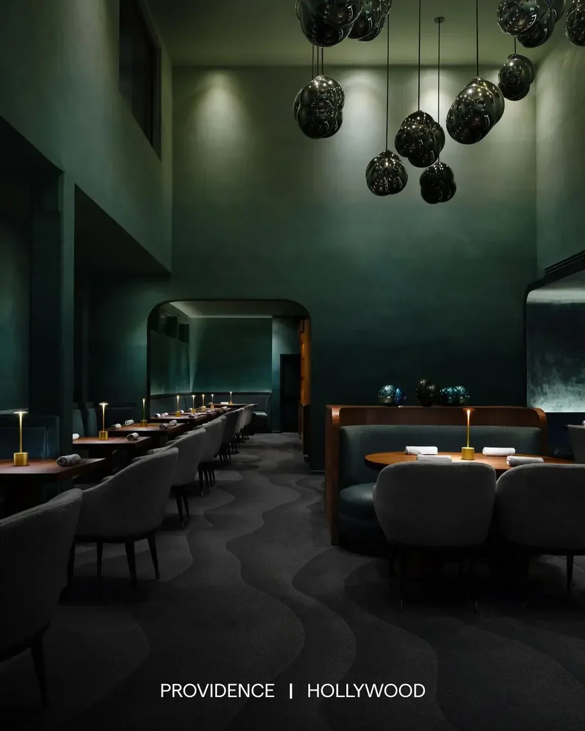 Interior of Kato restaurant in Los Angeles, featuring stylish seating and lighting