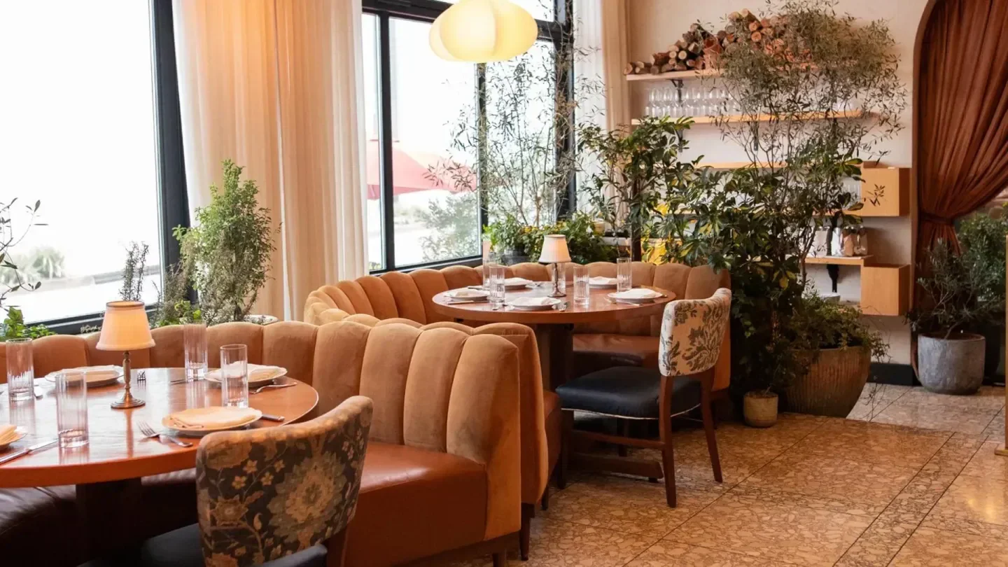 Cozy dining area inside LAVO Ristorante in Los Angeles with stylish seating and decor.
