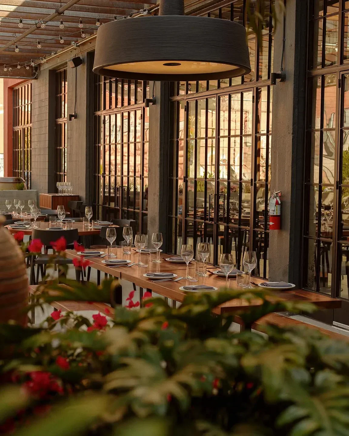 Dining space at Majordomo restaurant in Los Angeles with elegant table settings.