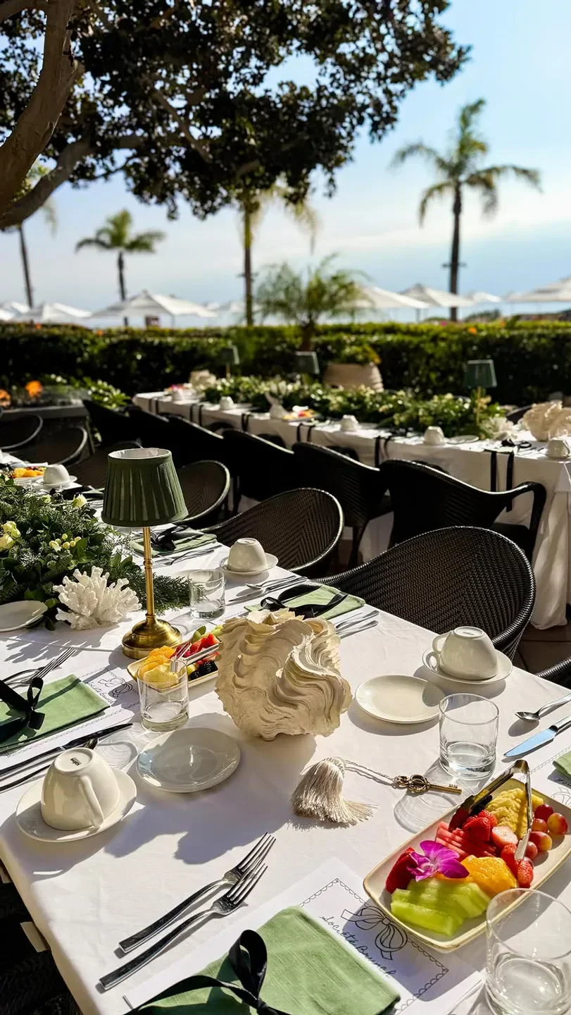 Outdoor dining at Mar'sel restaurant in Los Angeles, featuring elegant table settings and decor