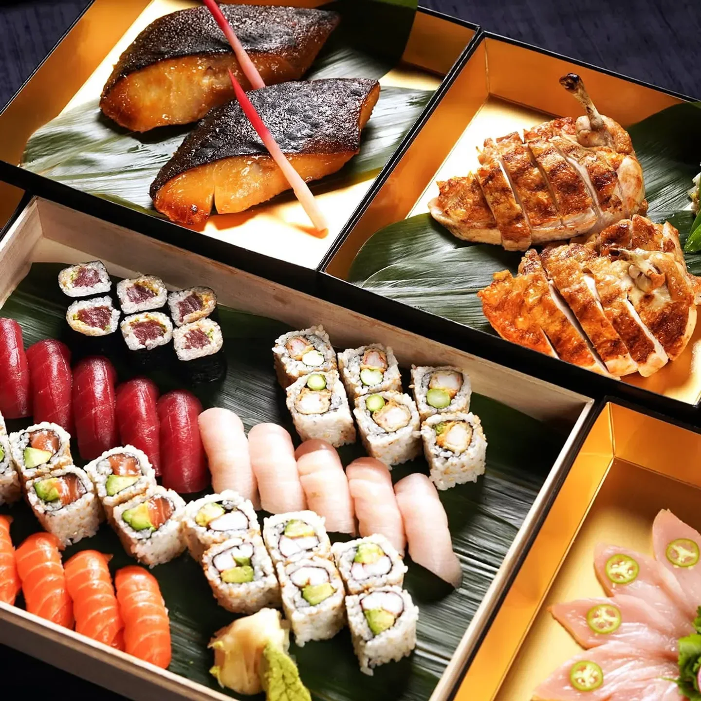 Delicious sushi and grilled fish platter at Nobu Los Angeles restaurant