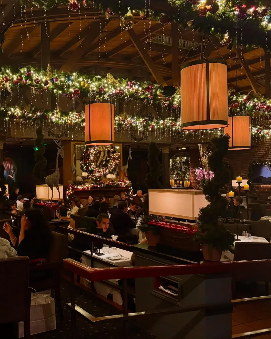 Festive holiday decor at Parkway Grill in Los Angeles, elegant restaurant interior.
