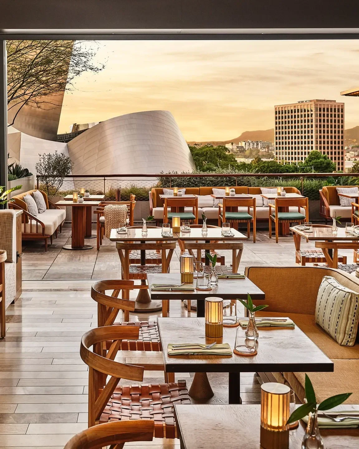San Laurel restaurant in Los Angeles, outdoor dining with city views and sunset
