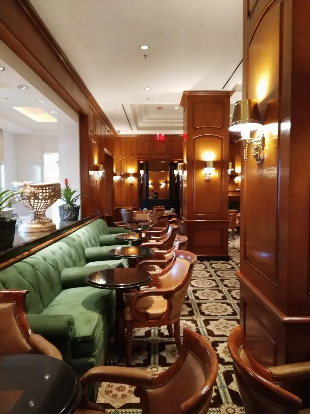 Interior of The Club Bar in Los Angeles with classic seating and elegant ambiance.