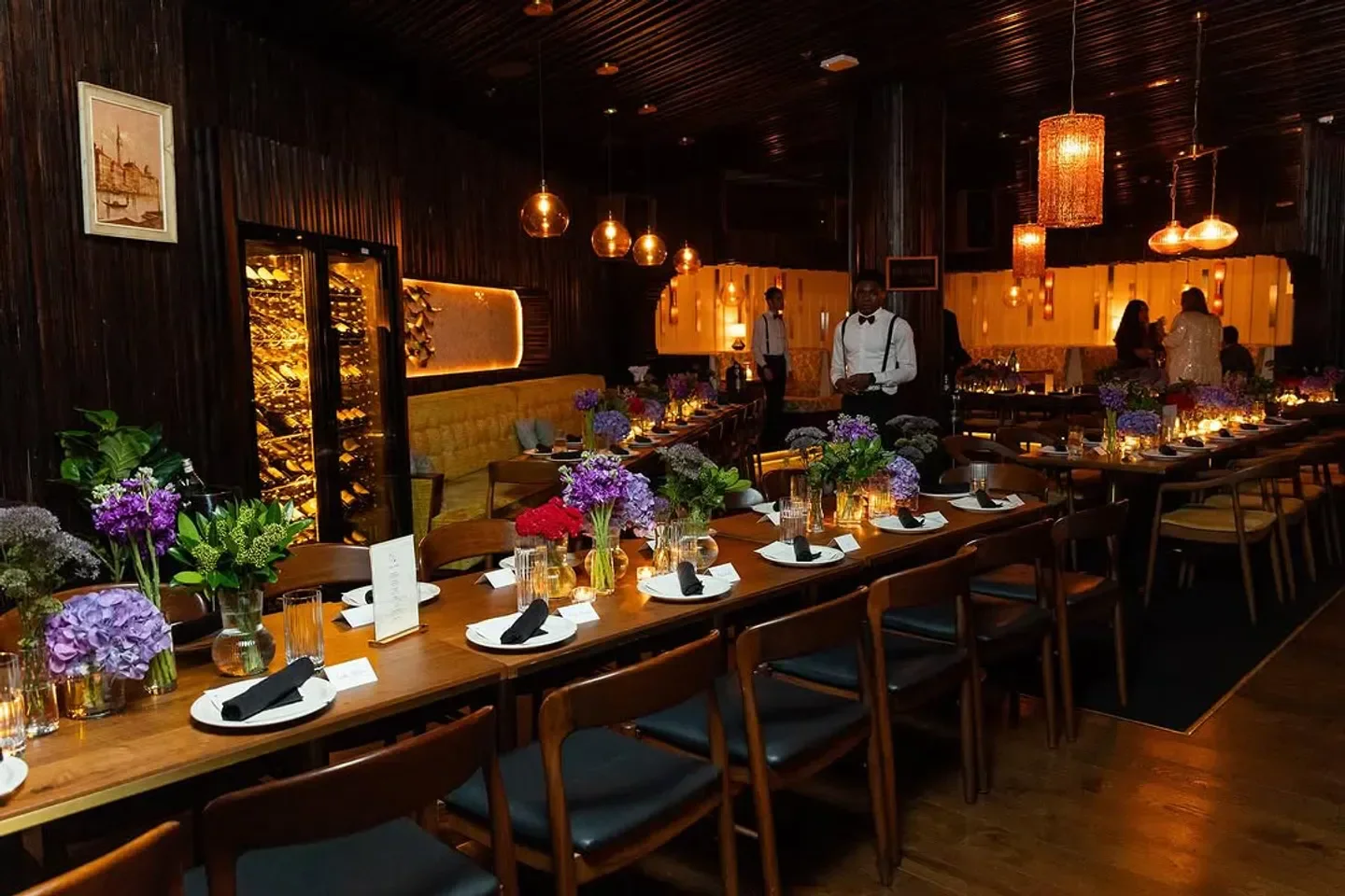 Interior of The Nice Guy in Los Angeles with table settings and flowers.