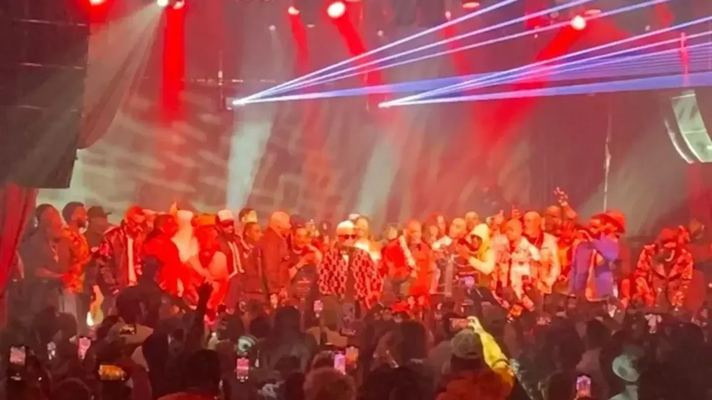 Crowd at The Vermont Hollywood nightclub in Los Angeles with red stage lights