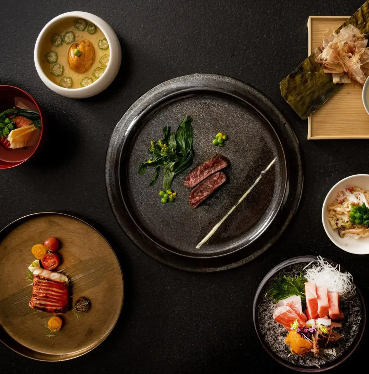 Delectable dishes at UKA restaurant in Los Angeles, including steak and sashimi.